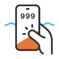 Hand holding a phone dialling 999