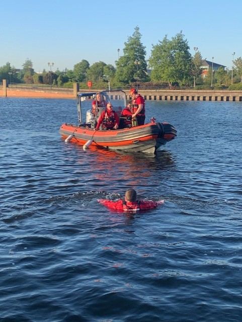 Crew approaching a person in the water